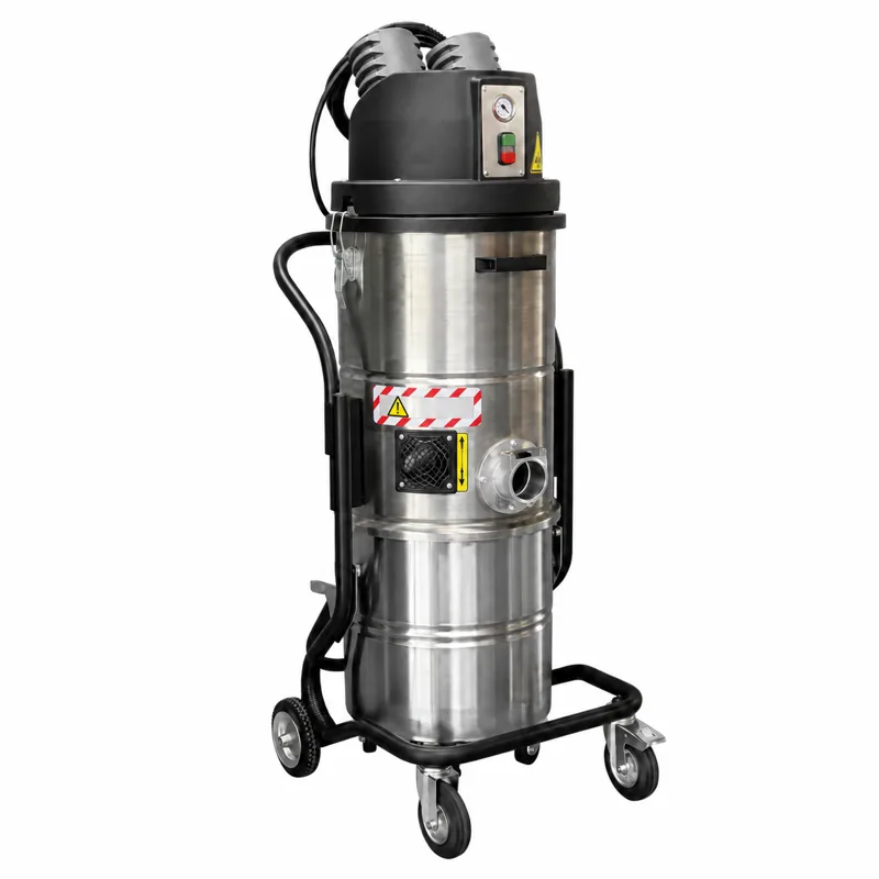 BL 45 ATEX: Aspirador de depósito metálico con cabezal negro, tubos laterales y base sobre ruedas.