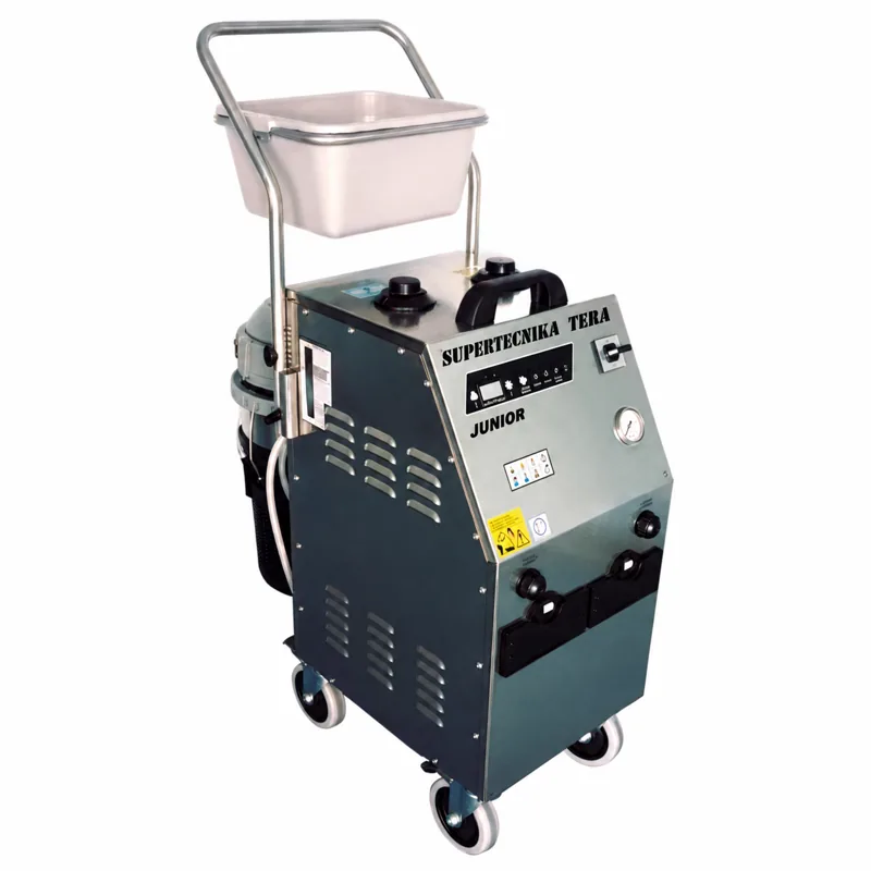 SUPER VEGA JUNIOR TWIN: Equipo de vapor metálico con bandeja superior, panel frontal, conexiones, ruedas grandes y ruedas giratorias.