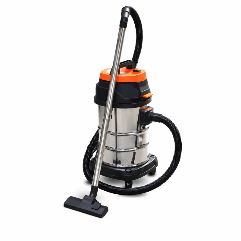 SWIFT TB916 30L: Aspirador de depósito metálico con cabezal negro y naranja, ruedas y manguera junto al cuerpo.